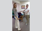 Catrina Crable assists the physical therapist at Palm City Physical Therapy.