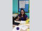 Julia Brada interns as a teaching assistant for sixth graders at Hidden Oaks Middle School.