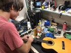 Jackson McNally repaired guitars and assisted with store operations at the Guitar Workshoppe.