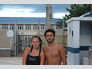 Lily Orazi and Hassan Moussa prepare for a swim meet with the Martin County swim team