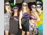 Allison Orr, Riha Wadhwa, Christina Mull, Vanessa Gonzalez, and Carlyn Loutos (left to right) get ready to dance the night away at the Masquerade Ball.